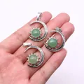 Three celestial sun and moon pendants with green gemstones held in hand for scale - Pendant Only (22x29mm, Without Chain) / Green Aventurine