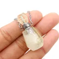 Natural yellow crystal perfume bottle pendant necklace with silver chain on hand - 25x38mm / Citrine