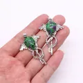Natural Amethyst crystal angel wing key necklace pendant with intricate silver metal detail - Ruby Zoisite