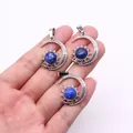 Three celestial sun and moon pendants with blue natural stone held in a hand for size - Pendant Only (22x29mm, Without Chain) / Lapis Lazuli