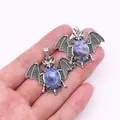 Bat pendant necklace with natural blue stone inlay and antique silver alloy finish - Blue Spot Stone