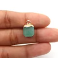 Close-up of green natural stone square pendant being held to show small size - Green Aventurine