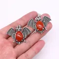 Gothic bat wing pendants in vintage silver finish with oval red natural stones - Red Jasper