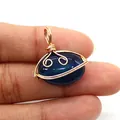 Blue oval striped agate pendant with gold wire wrapping and slime cartoon character design - Blue