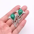 Green malachite teardrop stone pendant with silver angel wing and scepter key design - Malachite