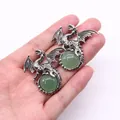 Silver dragon pendant featuring a translucent green stone in a vintage Viking style - 43x43mm / Green Aventurine