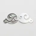 Natural sea shell wave-shaped pendants in iridescent black and white pearl finishes - Anchor Shape (070)