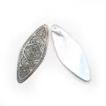 Marquise black shell pendant with intricate tribal carvings and natural iridescent finish - Rhombus (069)