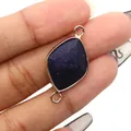 Macro shot of rhombus blue goldstone charm connector in rose gold frame for DIY jewelry - Blue Sandstone