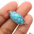 Detail van gefacetteerde ovale turquoise connector met vergulde lussen voor DIY sieraden - Blauw Turkoois