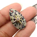 Macro detail of teardrop Dalmatian Jasper pendant with gold starburst and zircon inlay - Pendant Only (Without Chain) / Dalmatian Jasper