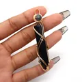Detailed wire-wrapped black obsidian hexagon pendant with gold wire craftsmanship - Hexagonal Column Wire Wrap Style / Black Agate