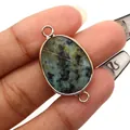 Oval natural stone connector in green and black texture with gold plated metal rim - African Turquoise