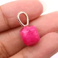 Macro detail of square cut rose red natural stone pendant with decorative metal bail - Pink Chalcedony