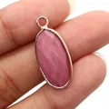 Gefacetteerde ovale roze rhodoniet hanger met goudkleurige rand voor DIY-sieraden - Rhodoniet