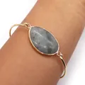 Gold plated open bangle with large oval grey natural stone and bohemian metallic texture - Flash Stone (Labradorite)