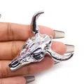 Macro detail of silver-plated bull skull pendant featuring realistic bone texture and ring - Polished Silver (No. 2)