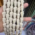 Detail of cream white spiral lava stone beads with porous texture for jewelry making - White (No. 8)
