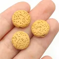 Natural yellow lava stone round beads for DIY jewelry making shown on hand - 12mm (6mm Thickness) / No.3 (Yellow)