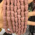 Close-up of pink conch-shaped porous lava stone beads for DIY jewelry making - 12x18mm (37g/String) / No.4 (Pink)