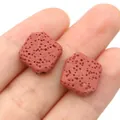 Reddish-brown square lava stone bead for DIY jewelry making shown on finger for scale - 14mm (1 Strand) / Reddish Brown