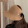 Foldable khaki straw sun hat with open top design and black silk bow decoration - M (56-58cm) / Khaki