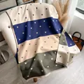 Navy blue and olive green heart pattern cashmere-like scarf with fringe detail - Cyan
