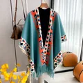 Bohemian knit poncho with geometric wave patterns and long tassel trim for women - Sky Blue