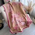 Floral cashmere feel winter scarf in camel with pink peony print and fringe details - Pink