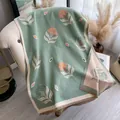 Sage green cashmere feel scarf with orange floral pattern and soft fringe tassels - Green