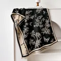 Scialle in finto cashmere con motivo jacquard a farfalla nero e beige e frange - 185cm / Nero