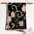 Detail of vintage floral pattern and beige tassels on soft black pashmina shawl - Peony Black