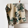 Detail of double-sided jacquard scarf with artistic lotus pattern and soft fringe edges - Green