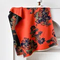 Faux cashmere shawl featuring orange and black contrast lotus print with fringe - Orange