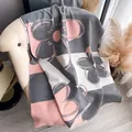 Winter faux cashmere scarf with pink and grey floral patterns and fringe details - Gray