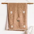 Faux cashmere shawl in camel featuring vintage camellia floral print and tassel edges - Camellia - Khaki