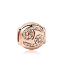 Abalorio esférico de oro rosa con diseño floral de circonitas para pulseras - Cáncer