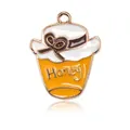 Gouden honingpot bedel hanger met wit emaille deksel en Honey tekst voor sieraden - Grote Honingpot