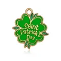 Golden clover charm for Saint Patrick's Day with green enamel finish and festive text - St. Patrick's Clover Plate