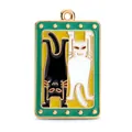 Tarot style enamel charm featuring black and white mirror cats with green border - Guardian Twin Cats