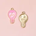 Colgante bombilla corazón Love rosa con acabado metálico dorado para joyería DIY - Bombilla LOVE Rosa