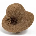 Handwoven straw sun hat for women with decorative floral detail and wide brim - M / Khaki