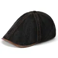 Detailed shot of black denim beret with brown leather trim and contrast stitching - Adjustable / Black Denim