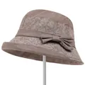 Detail of elderly women's sun hat featuring brown fabric with leaf pattern ribbon bow - M / Khaki