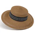 Close-up of bohemian straw hat with intricate woven textures and ethnic pattern ribbon - M (56-58cm) / Khaki
