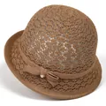 Detail of hollow woven sun hat with bow tie and pearl accent on brown straw material - M (56-58cm) / Khaki