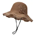 Close-up of brown knitted sun hat featuring a 3D floral accent and adjustable wind strap - M (56-58cm) / Khaki