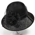 Close-up of black organza sun hat with mesh veil featuring heart dots and a fabric rose - M / Black