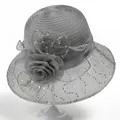 Detail of grey organza hat featuring a large 3D silk flower and colorful sequins - M / Gray