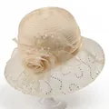 Close-up of elegant organza sun hat with large floral petal detail and sequin mesh trim - M / Beige